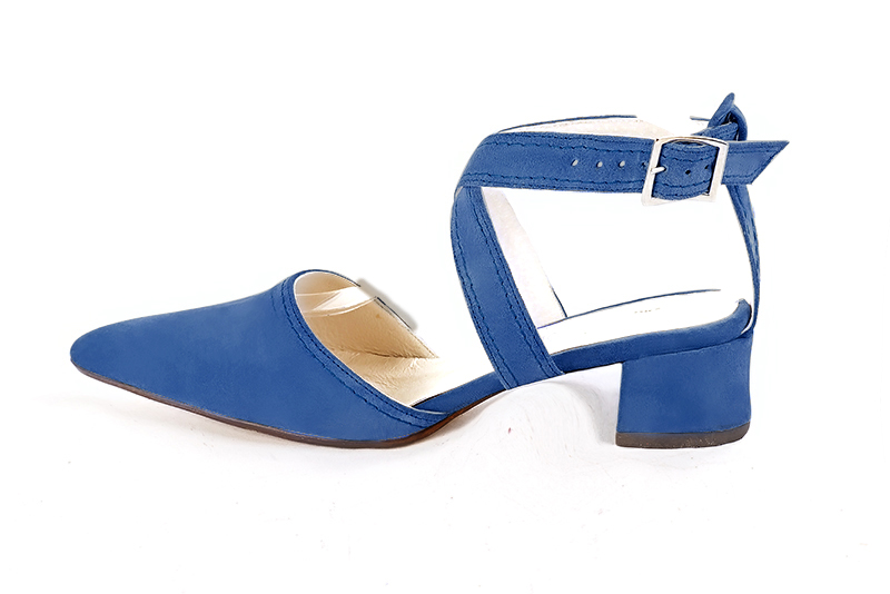 French elegance and refinement for these electric blue dress open back shoes, with crossed straps, 
                available in many subtle leather and colour combinations. Perfect for feminizing and enhancing basic outfits.
Good comfortable fit and good support from the adjustable crossover straps.
To personalize or not, according to your outfits or your desires.  
                Matching clutches for parties, ceremonies and weddings.   
                You can customize these shoes to perfectly match your tastes or needs, and have a unique model.  
                Choice of leathers, colours, knots and heels. 
                Wide range of materials and shades carefully chosen.  
                Rich collection of flat, low, mid and high heels.  
                Small and large shoe sizes - Florence KOOIJMAN
